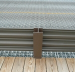 Bridge guard rail covered in TGIC polyester powder.